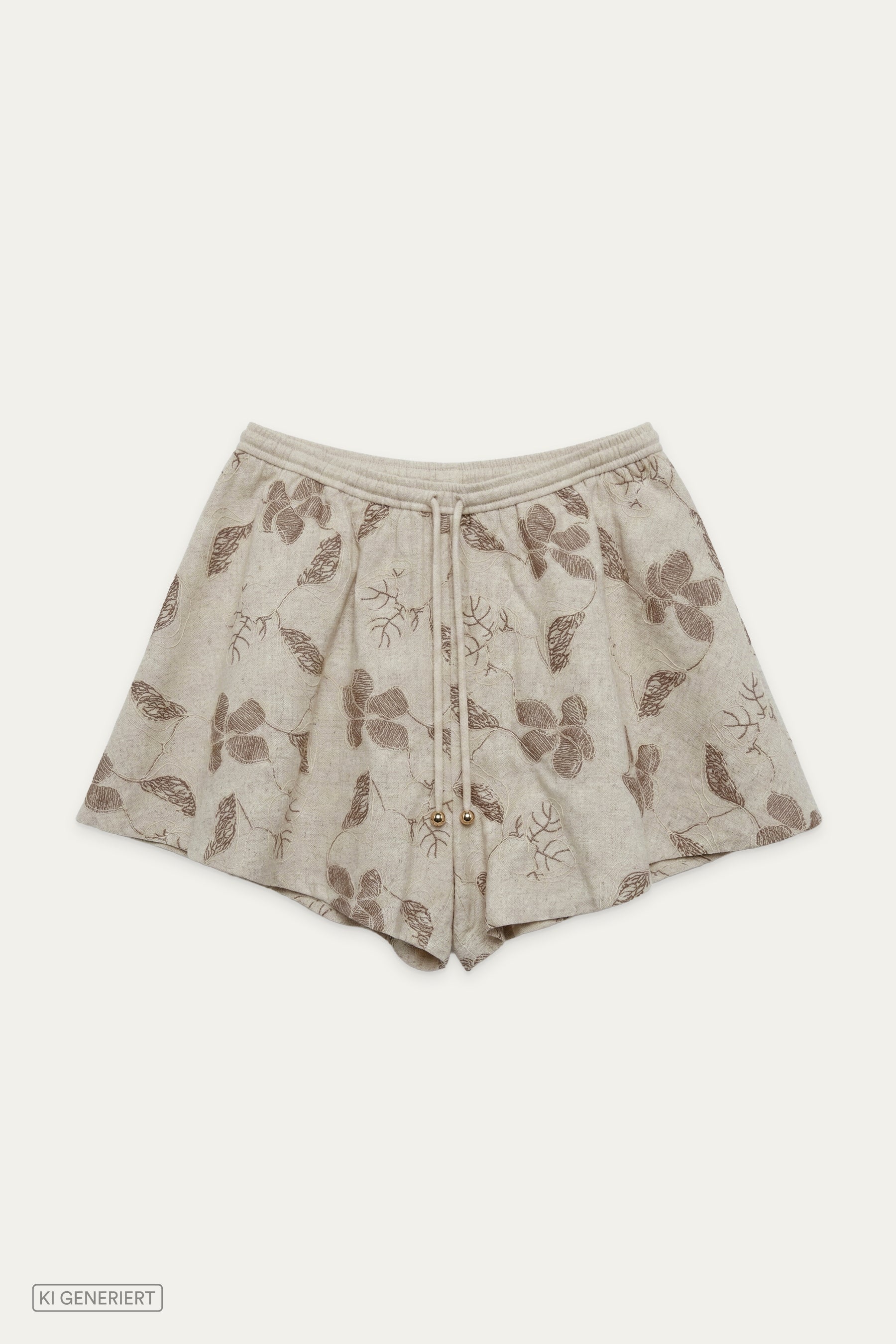 Beige Shorts mit floralem Muster, elastischem Bund und Bindeband, flach liegend vor neutralem Hintergrund