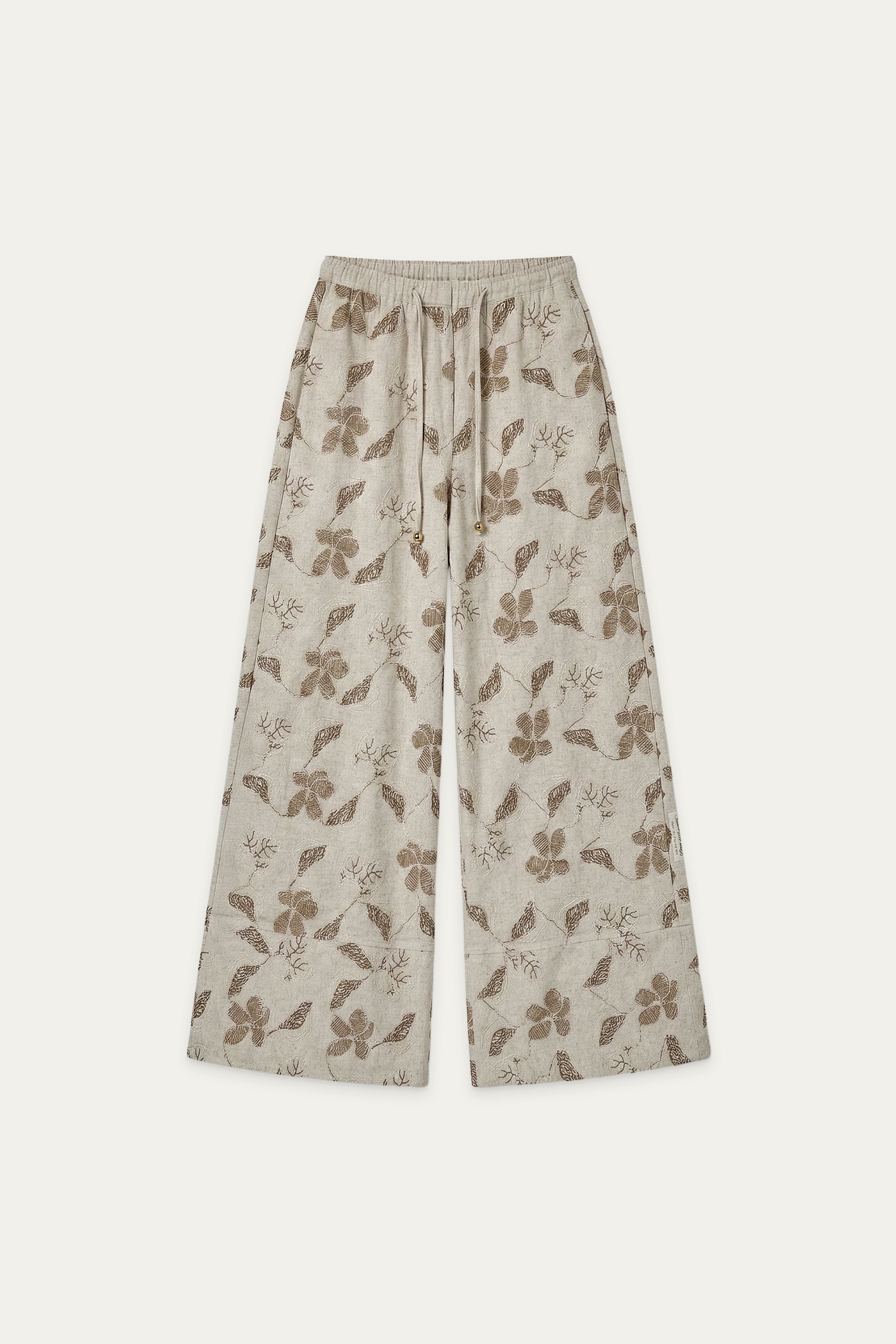 Beige Wide-Leg-Hose mit elastischem Bund und Kordelzug, kombiniert mit passendem Kurzarmhemd mit Kragen